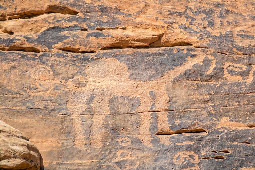 Jabal Umm Sanman ancient rock art showing camels near Jubbah, Saudi Arabia. Rock Art in the Hail Region UNESCO World Heritage Site.