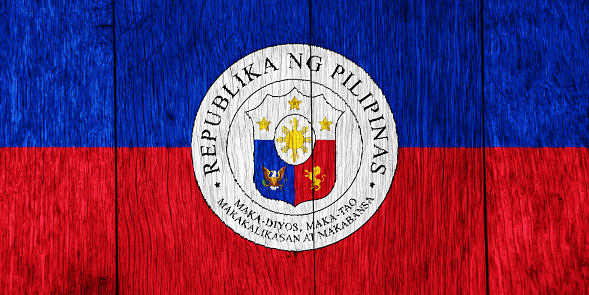 Flag and coat of arms of Republic of the Philippines on a textured background. Concept collage.