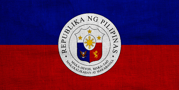 Flag and coat of arms of Republic of the Philippines on a textured background. Concept collage.