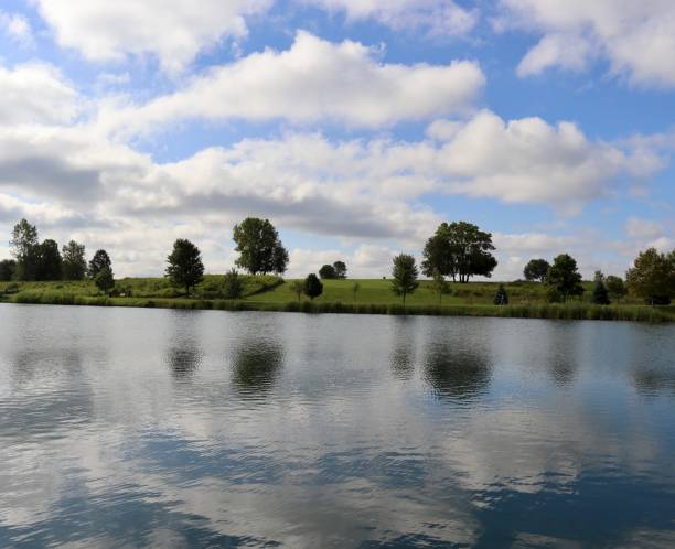 istock Peaceful Pond in the Country 1760141265