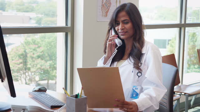 Doctor gives patient test results over the telephone