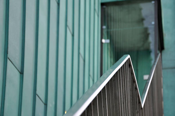 stairs with focus on the inside guardrail stock photo