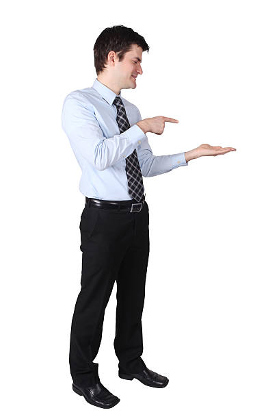 istock Businessman pointing to something in his hand 176015895