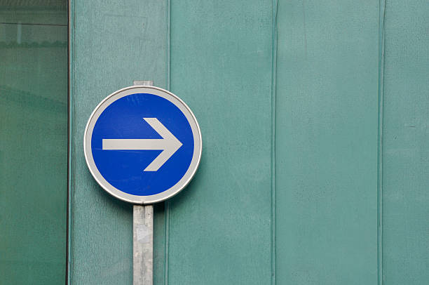 istock arrow street sign against a copper wall 176016085