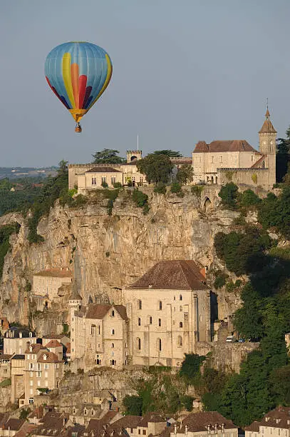"One hot-air balloon and the town of Rocamadour in the Lot, district. France.The town is an old pilgrim place on the way to Santiago de Compostella.Taken in the first sunlight of a summer day.See also my lightbox ""France"""