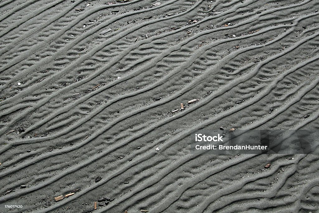 Dirty Lines in the Sand Debris highlights lines in the sand. Beach Stock Photo
