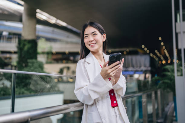 istock Young beautiful businesswoman holding the documents and walking to work. 1760176710