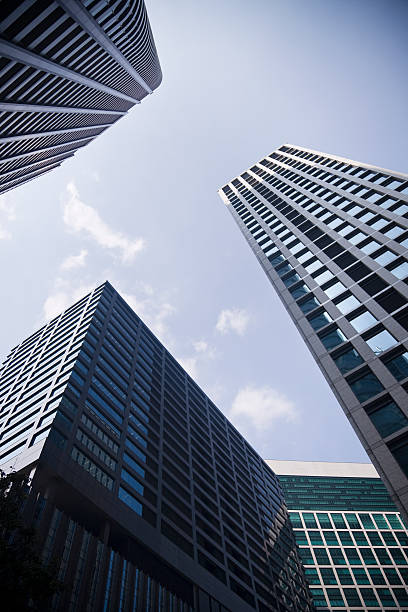 shinbashi grattacieli - shimbashi district skyscraper building exterior low angle view foto e immagini stock