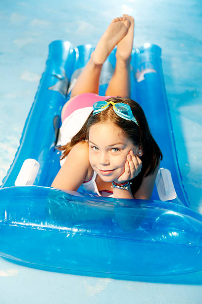 istock Young girl on an air mattress 176017975