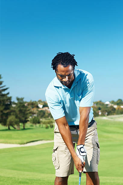 istock African American playing game of golf 176018191