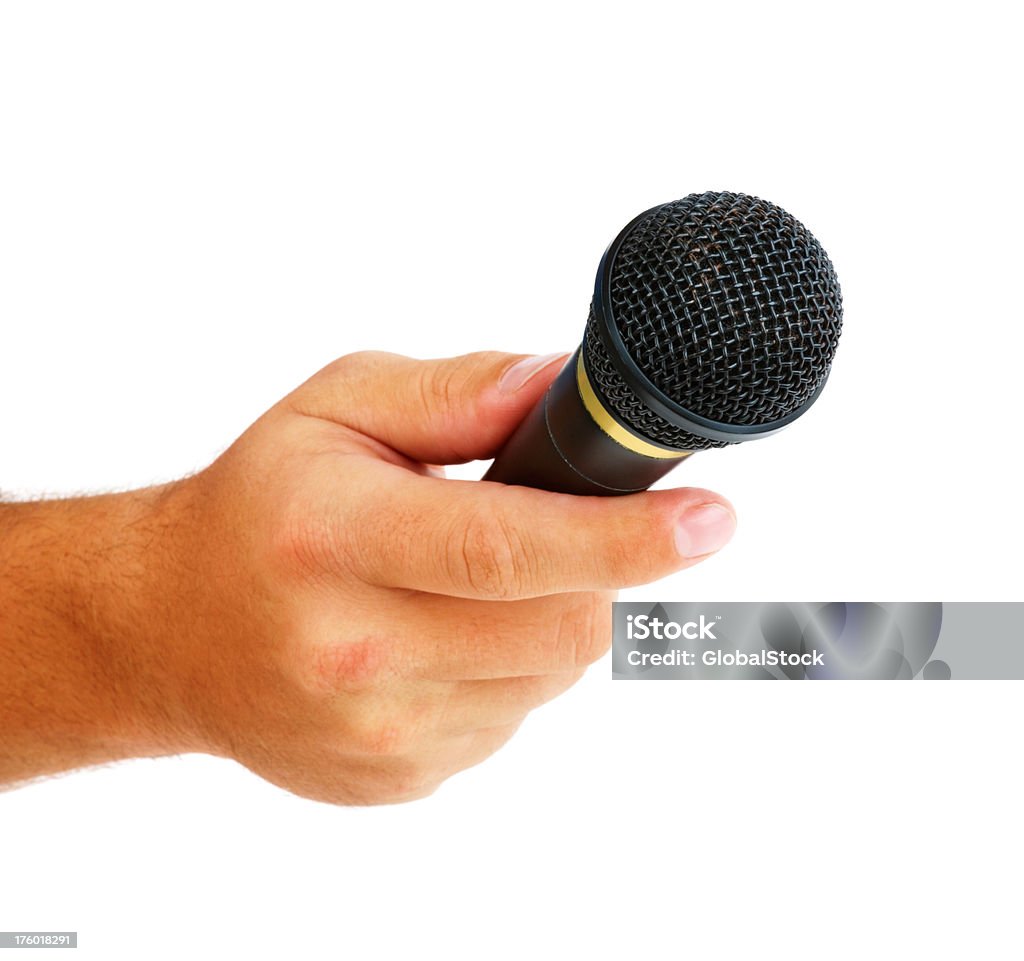 Mano agarrando micrófono aislado - Foto de stock de Adulto libre de derechos