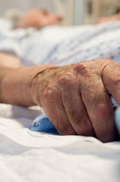 istock Hospital Bed - Sickness Senior Citizen Hand 176018560