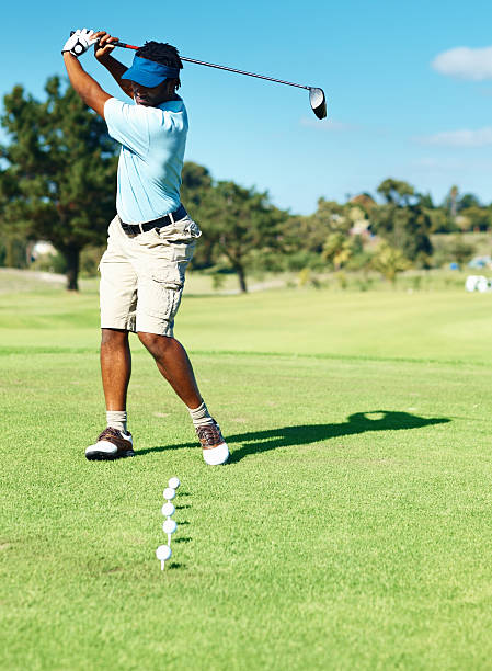 istock Golfer during a swing shot at his practice run 176018996