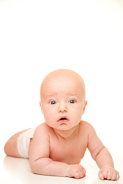 The Cutest Baby in the world isolated on white looking at the camera.  Vertical layout.  Canon 5DmkII.Thanks for looking at this file. You might also like: