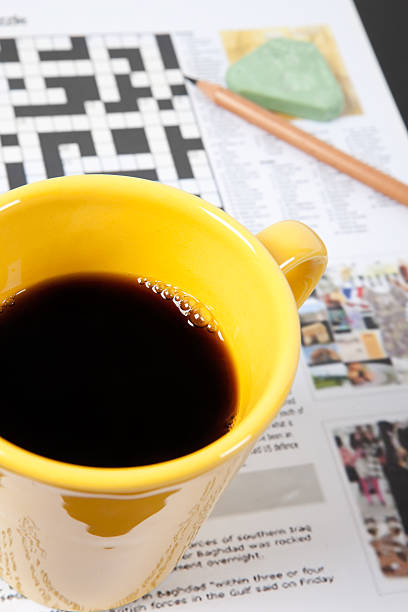 istock Crossword puzzle and coffee 176019240