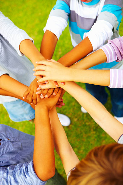 istock Cropped image of small kids with hands together 176021212