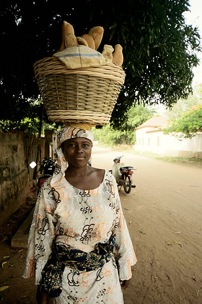 istock african girl with bread 176021520