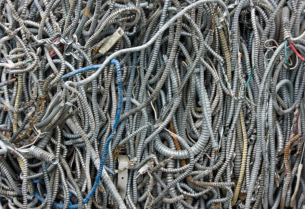 scrap wire compressed into block at recycling plant stock photo