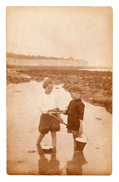 istock Children Crabbing at the Beach 176022656