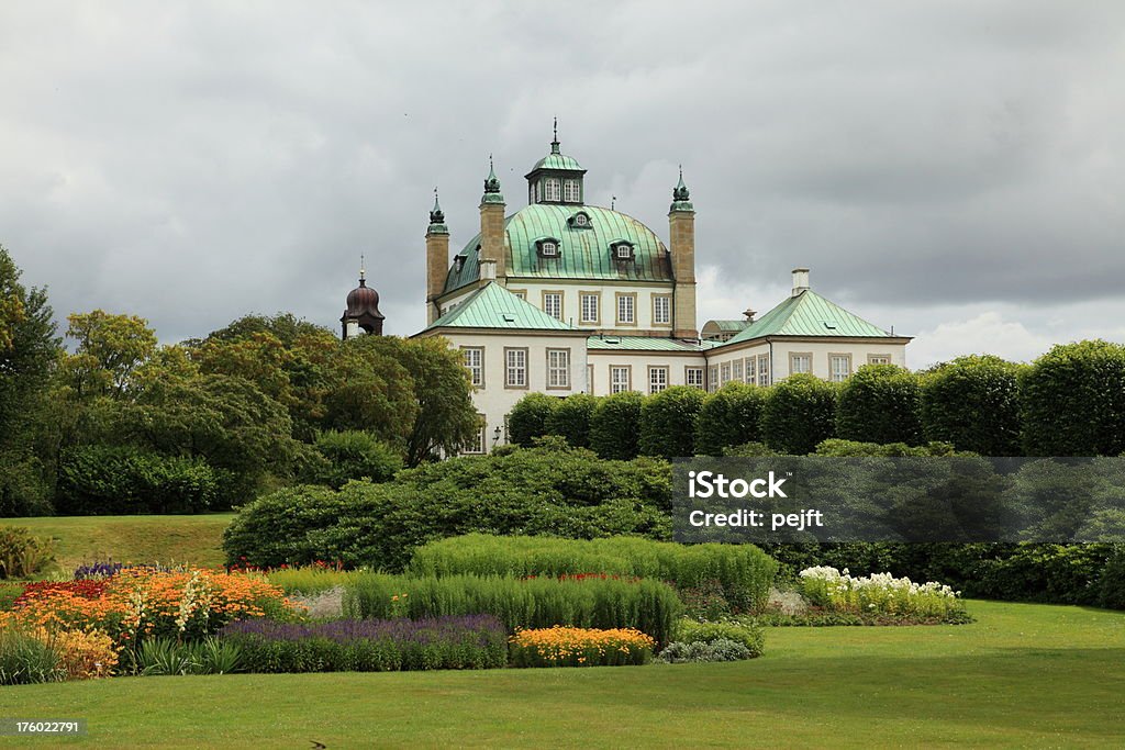 Fredensborg Slot (Castle) seen from the private garden "The royal summer castle Fredensborg Slot in Fredensborg in northern Zealand, Denmark seen from the so called private garden. The private garden is open to the public in July when the Royal family does not use the castle.Fredensborg means Castle of Peace. It was build as a peaceful residence in Northern Zealand. The word peace referring to the peace treaty between Denmark and Sweden in the year 1720 century after 3 centuries of war between the two nations. This peace still last!Some other castles in my portfolio:" Castle Stock Photo