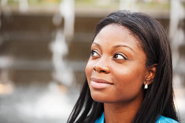 istock Smilng Woman Looking Up 176022842