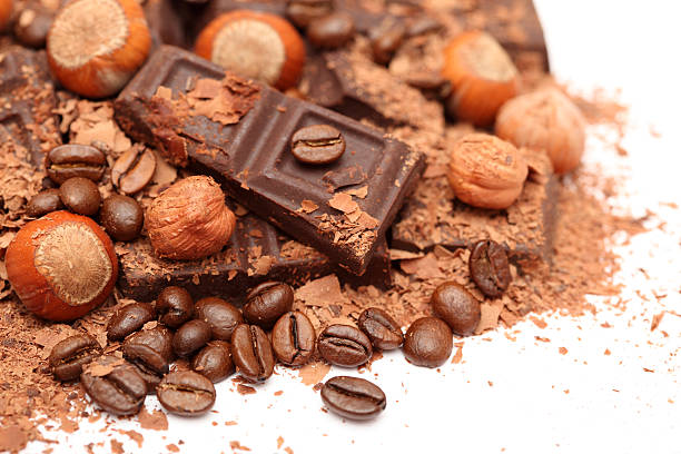 istock Pieces of chocolate with hazelnuts and coffee beans 176023245