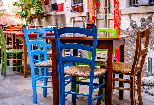 table and chairs at a typical italian restaurant