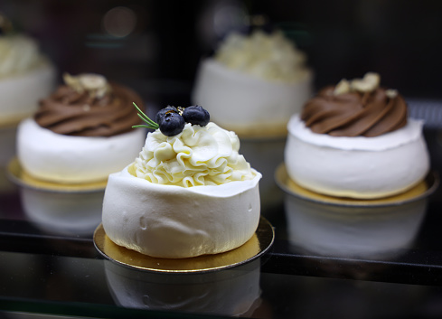 delicious milk meringues cake on golden plate