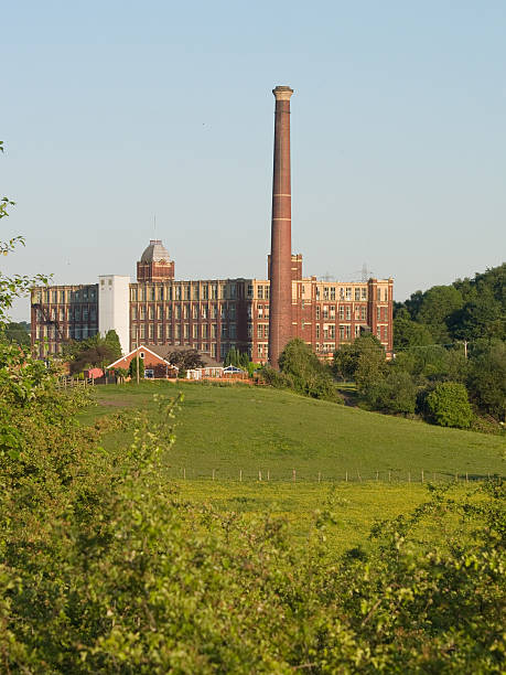 istock Lancashire cotton mill in a rural setting near Stoneclough 176025226