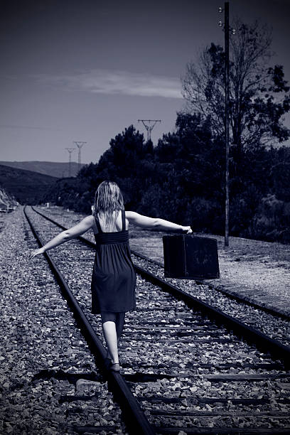 istock Girl in a railway 176025414