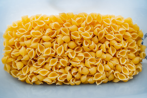 Pasta view from above. Close-up of pasta. Wheat food, yellow color. High quality photo