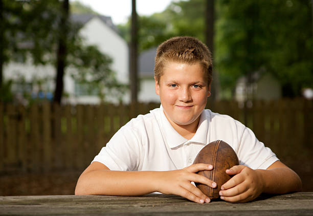 istock football child 176025851