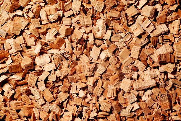 Wood Chip Background "Wood Chip Background, from Venezuela, to Japan paper mills." wood chip stock pictures, royalty-free photos & images