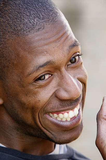istock Black man laughing portrait 176025927