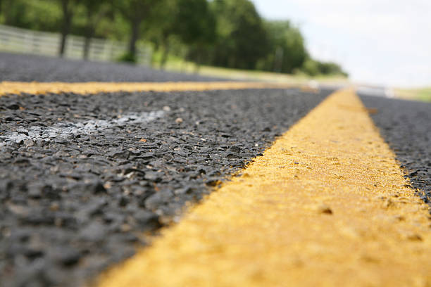 istock Closeup of Road Yellow Stripe. 176026157