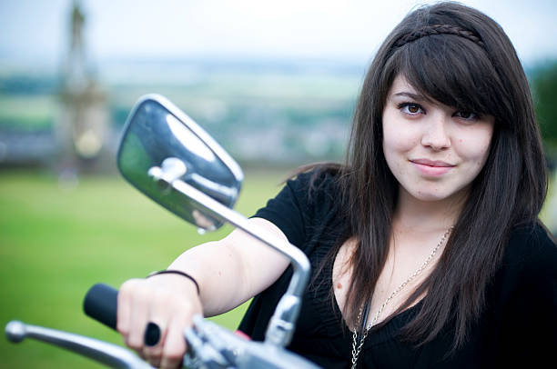 istock Girl on motorbike 176026374