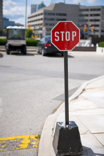 Miniature and portable Stop Sign as often used at construction sites or parking lots to temporary control traffic flow.