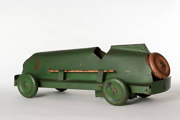 istock Vintage tin toy racing car isolated on white background 176027213