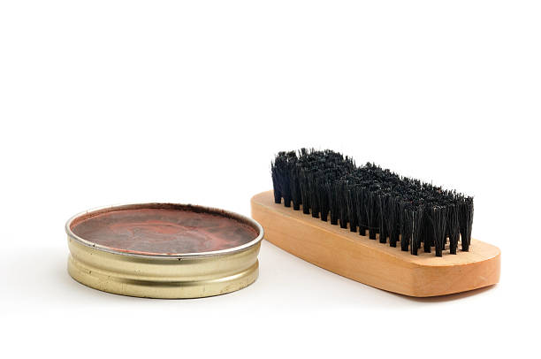 Shoe Polish Shoe polish and a brush isolated on white. shoe polish photos stock pictures, royalty-free photos & images