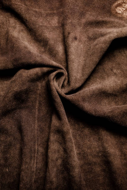 istock Natural dark suede background texture. Manufacturing from genuine leather.Hobby and craft. 1760285349