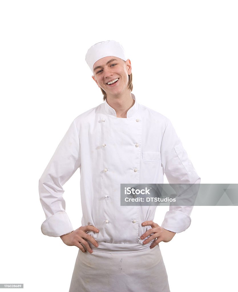 Young Chef Smiling, Hands on Hips Image of a young chef who is smiling with his hands on his hips. 20-29 Years Stock Photo