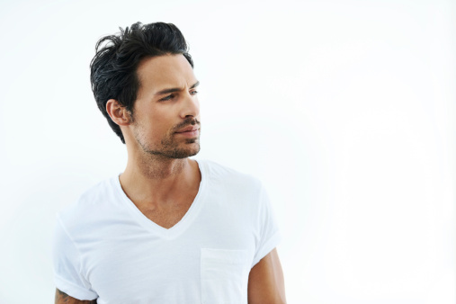 Shot of ruggedly handsome man wearing a white t-shirt