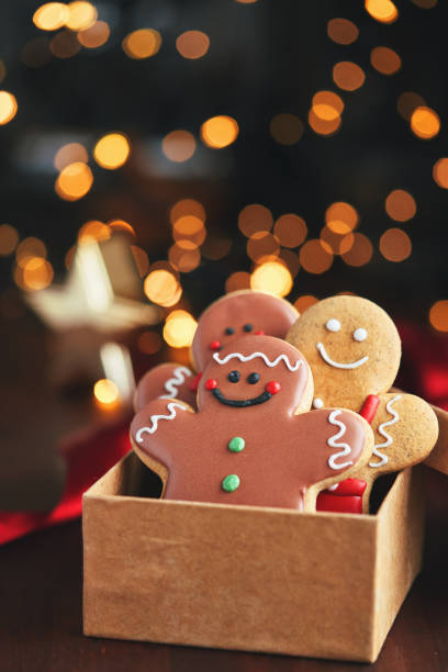 istock Decorated Gingerbread Man Christmas Cookies on Christmas Background 1760301951