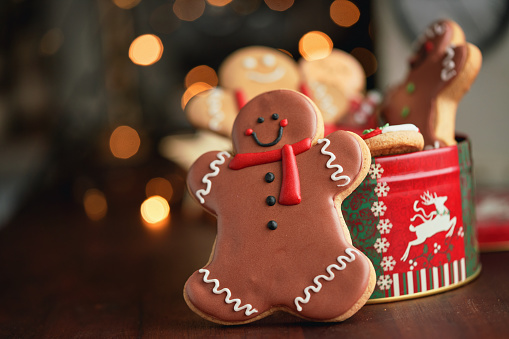 Decorated Gingerbread Man Christmas Cookies on Christmas Background
