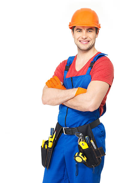 istock Portrait of smiling handyman with tools 176032399