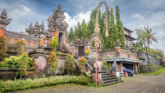 Lot of temples, typical scene and beautiful landscapes surrounding the town of Ubud, Bali, Indonesia. There are plenty of rice fields and magnificent small farms and charming shops.