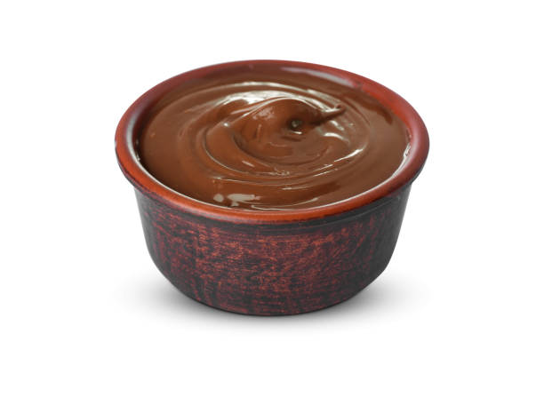 istock Bowl of tasty chocolate paste isolated on white 1760339386