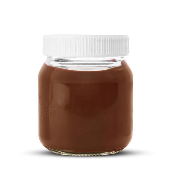 istock Jar of tasty chocolate paste isolated on white 1760339398