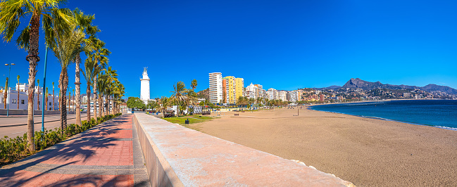 Malaga beach and lighthouse panoramic view, Andalusia region of Spain