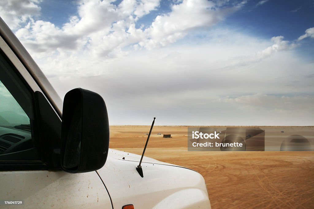 Sahara safari jeep "Jeep safari on top of dune at Sahara desert, few jeeps far, Tunisia" 4x4 Stock Photo